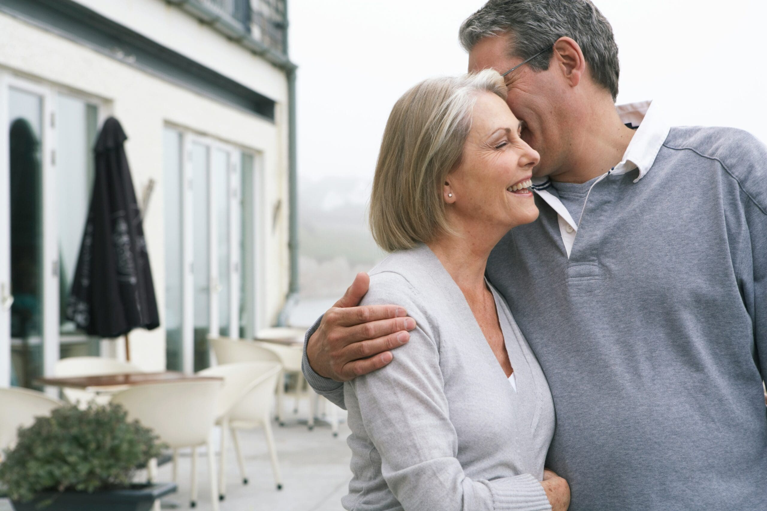Woman and man in thoughtful conversation building emotional safety and connection in their relationship