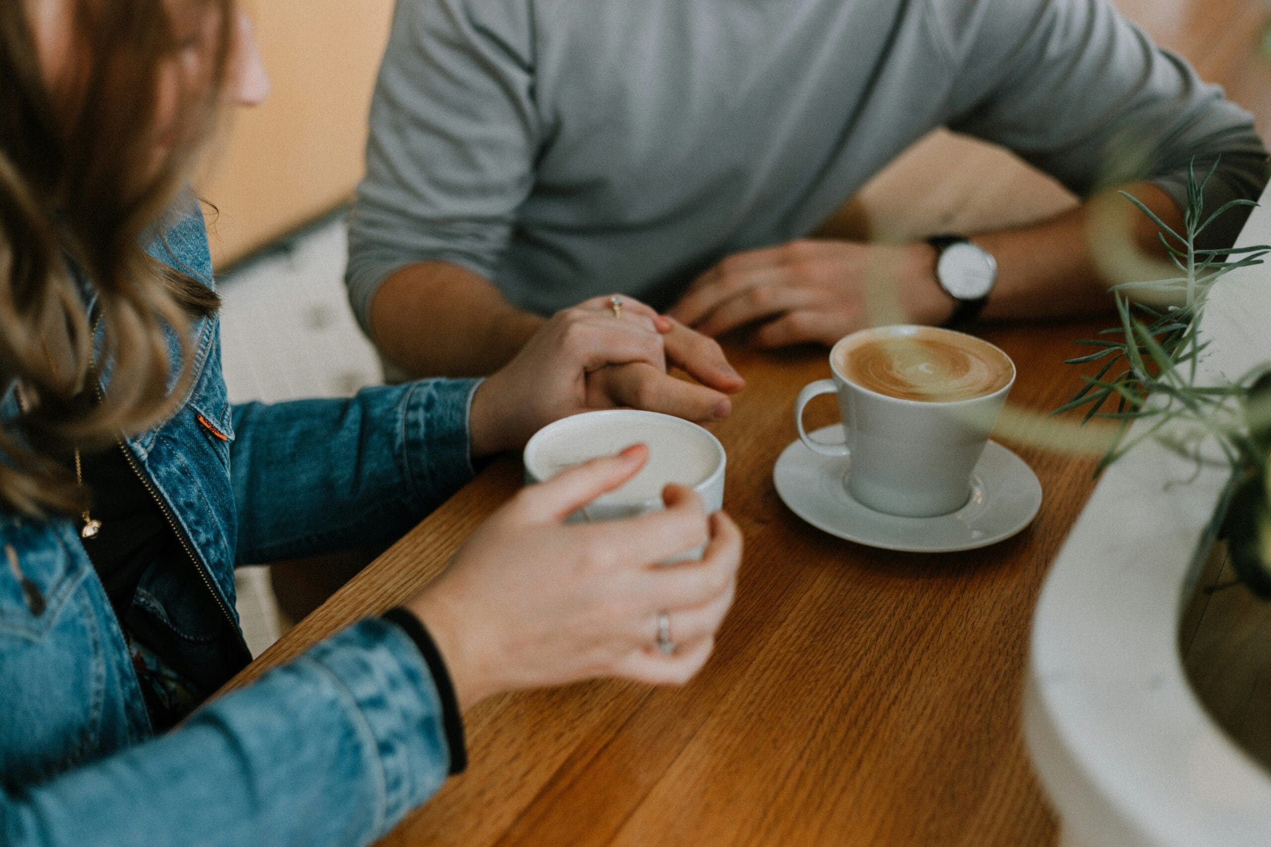 Couple having a calm and connected talk while navigating difficult conversations in their relationship