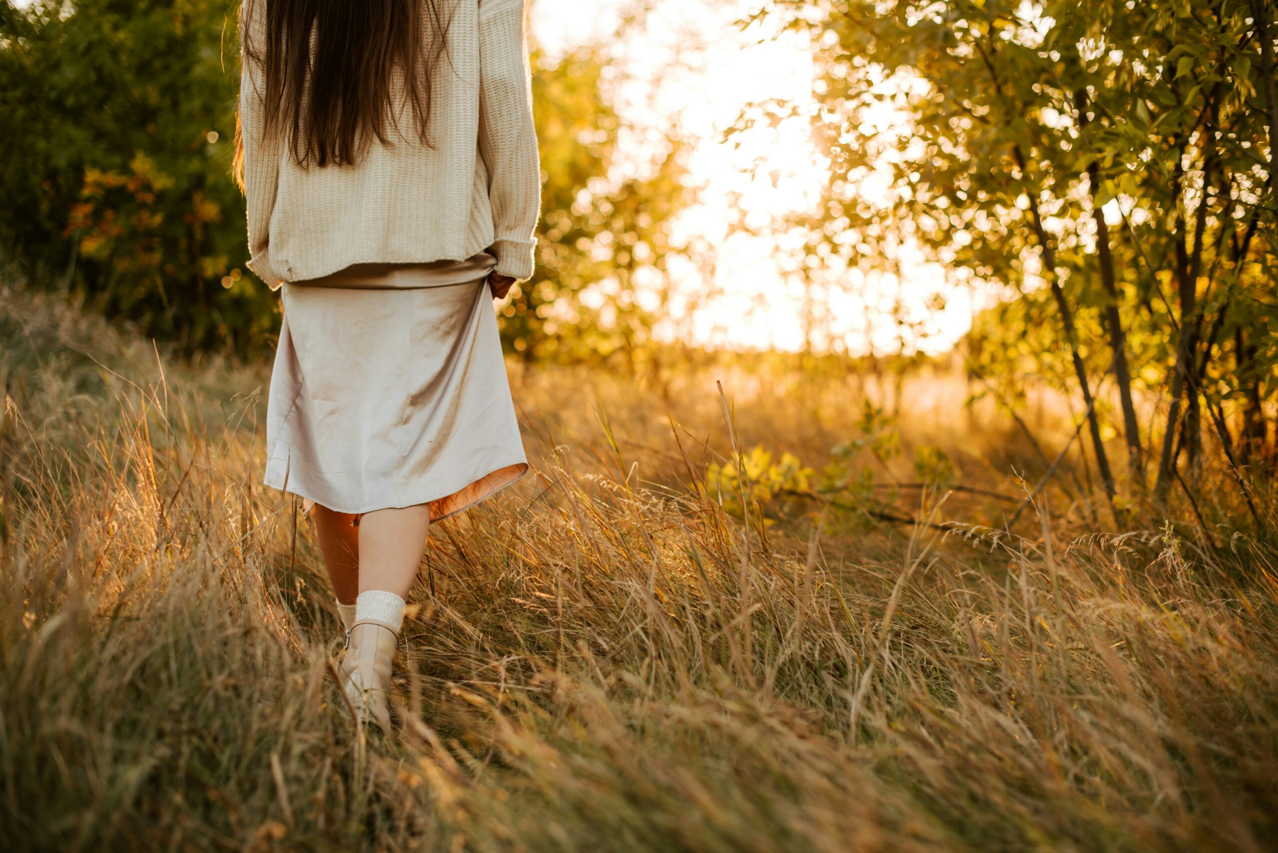 Woman reflecting on victim consciousness and personal growth during a relationship transformation